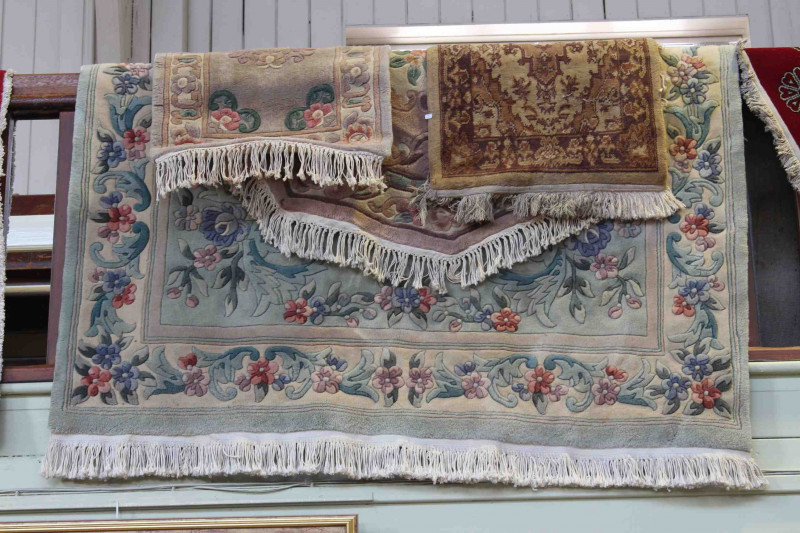 Green ground Chinese carpet and three Chinese rugs (4)
