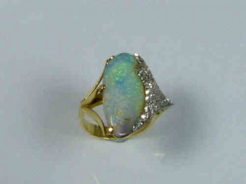 Opal and Diamond Ring with a Yellow Gold Band, Tests as 18-22 Carat, Size...