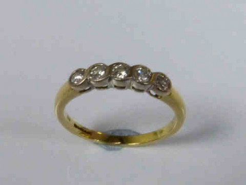 Five Stone Diamond Ring with an 18ct Yellow Gold Band, Size Q
