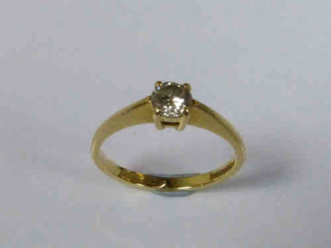 Solitaire Diamond Ring, the Diamond Estimated to Weigh 0.25 Carats on...