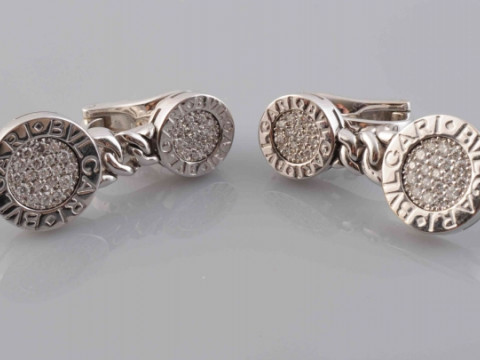 A PAIR OF DIAMOND EARRINGS BY BULGARI, from the Tubogas range, formed...