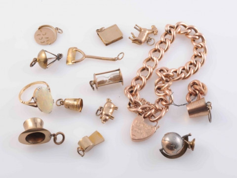 A VICTORIAN HEART LOCKET BRACELET, the heavy curb links with engraved...