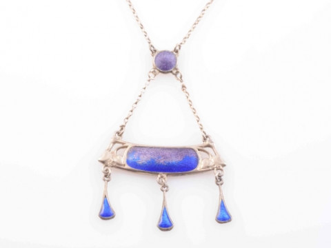AN ARTS AND CRAFTS SILVER AND ENAMEL PENDANT BY CHARLES HORNER, CIRCA...