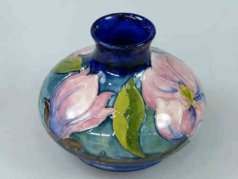 Moorcroft Squat Vase decorated with magnolia on blue ground