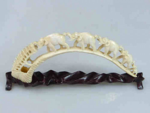 Carved Ivory Bridge of Elephants on carved wood stand