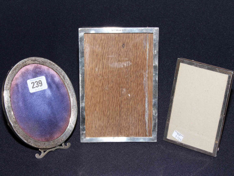 Three silver picture frames