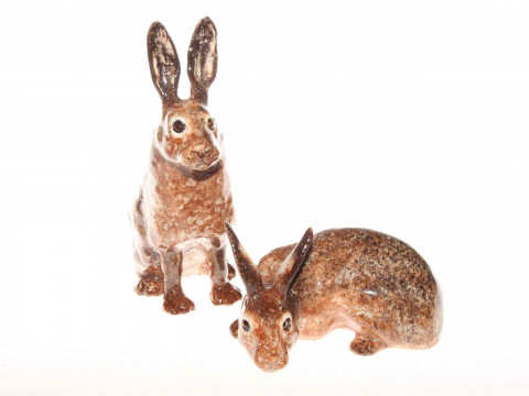 Two Winstanley models of hares, size 3