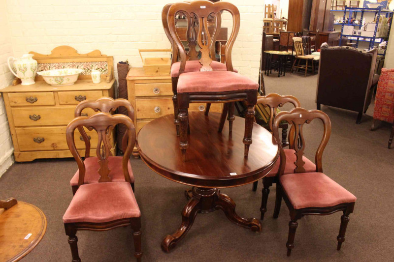 Victorian mahogany oval snap top breakfast table and six Victorian mahogany spear back dining chairs