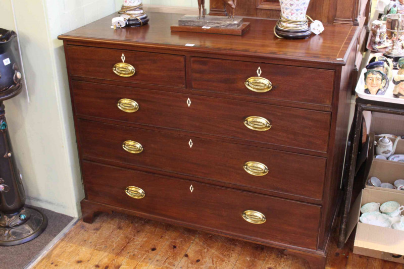 Victorian inlaid mahogany four height chest on bracket feet