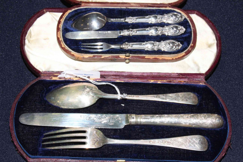 Two silver christening sets