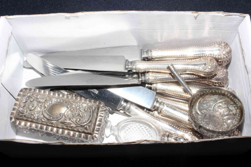 Twelve silver handled knives, silver trinket box, etc