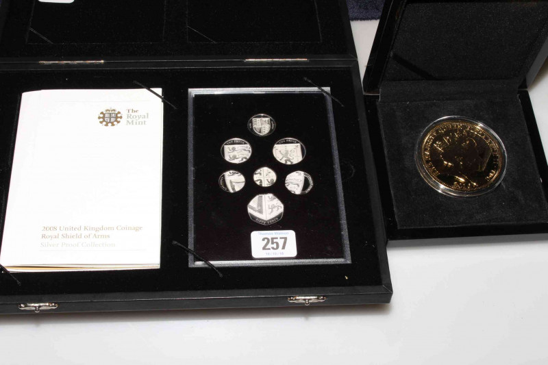 Set of silver proof 2008 UK coinage, in display box; and a 3.5oz gold plated five crowns coin, in display box, all with certificates
