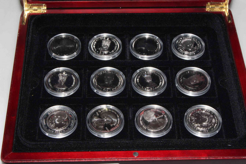 Twelve sterling silver coins in display box, with certificates, approximately 1oz in total
