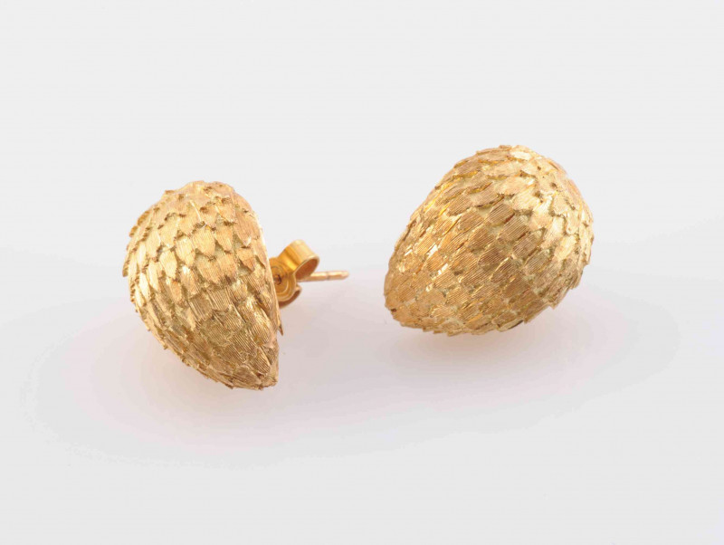 A PAIR OF ITALIAN MADE YELLOW GOLD STUD EARRINGS, formed as domed pear-shaped mounts set with textured feathered metal detailing to the entirety on post and scroll fittings. Stamped KT18. Marked Italy. Total weight 12.1 grams.