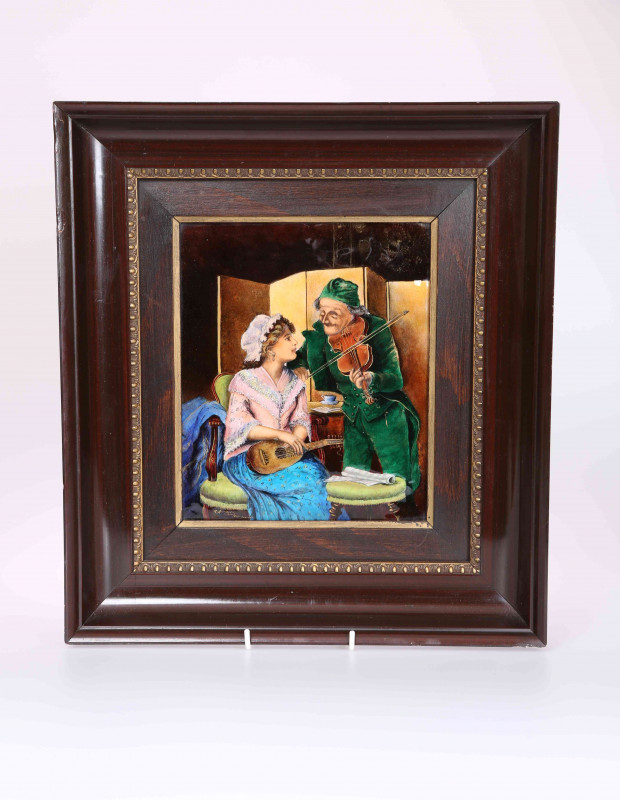 AN EARLY 20TH CENTURY LIMOGES ENAMEL (ON COPPER) PLAQUE, 'A DIFFICULT NOTE', depicting a fiddler playing to a seated lady holding a lute, titled and indistinctly signed, framed. Plaque 23.5cm by 19cm, overall 42cm by 37cm