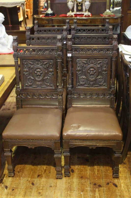 Set of six Victorian oak carved panel back dining chairs