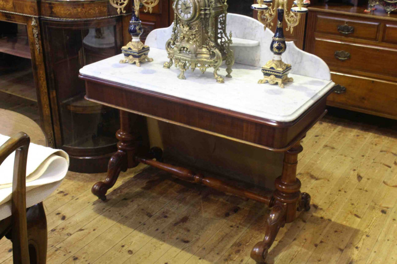 Victorian marble topped washstand raised on turned pillars joined by turned stretcher, 98.5cm x 111cm