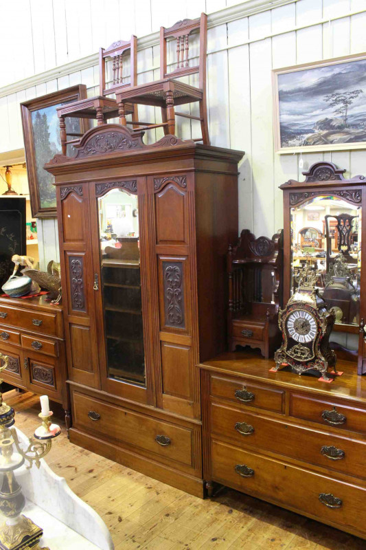 Victorian walnut five piece bedroom suite comprising mirror door wardrobe, dressing table, linen chest and pair bedroom chairs