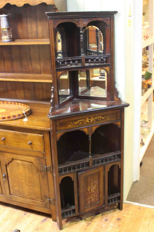 Victorian rosewood and satinwood inlaid corner cabinet, the mirror panelled top above an open compartment with central inlaid door below, 165.5cm x 64cm