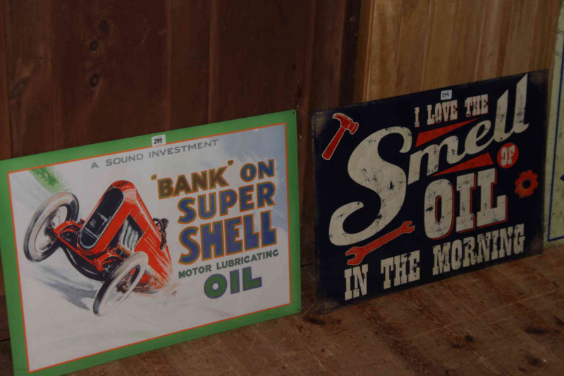 Two signs, Bank on Super Shell and I Love the Smell of Oil