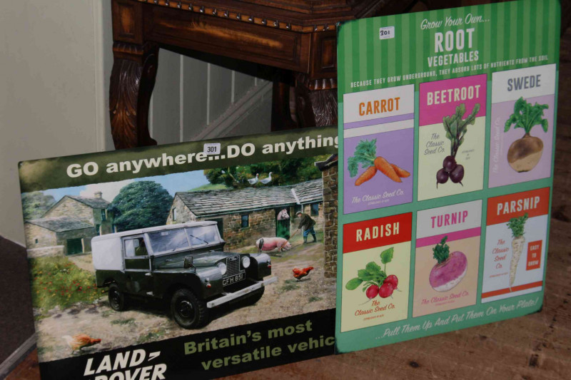 Two signs, Land Rover and Root Vegetables