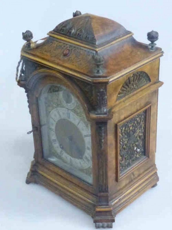 Carved Walnut Bracket Clock with Arched Brass and Silvered Dial