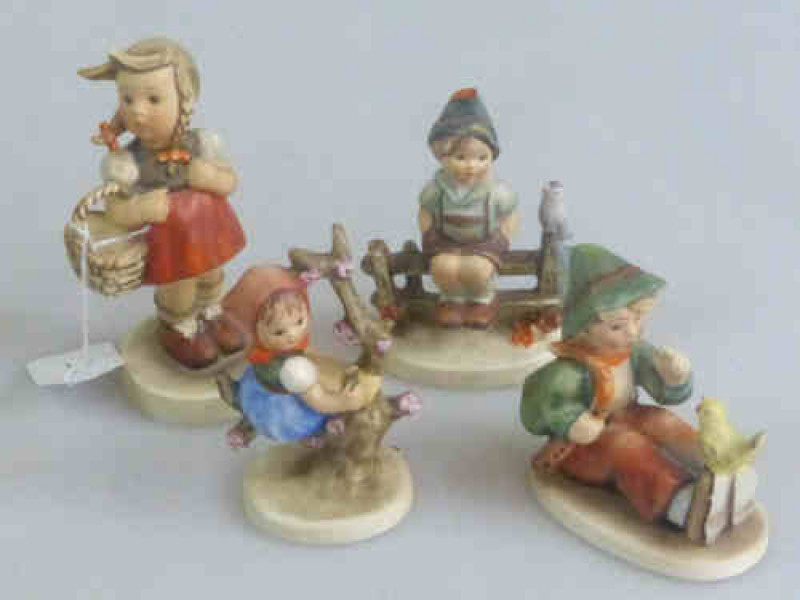 Four Hummel Figures