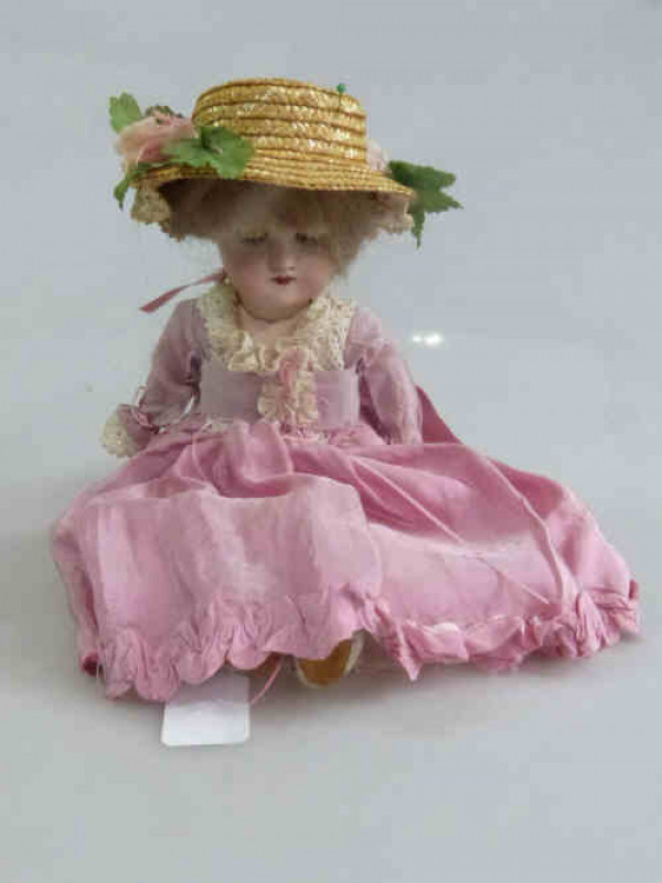 Vintage Doll with Straw Hat