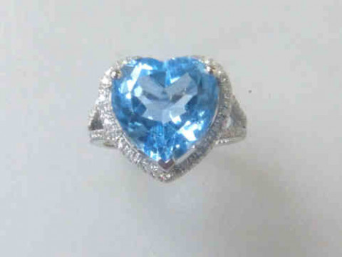 Blue Topaz and Diamond Ring, the heart shaped topaz approximately 6.75ct,...