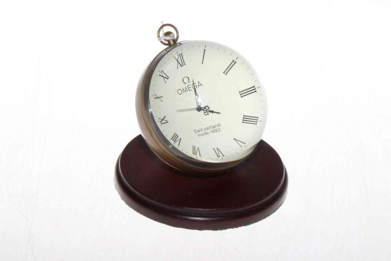 Omega glass spherical desk clock