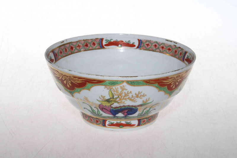19th Century porcelain bowl with Chinoiserie decoration in panels, polychrome with gilt, 17cm diameter  