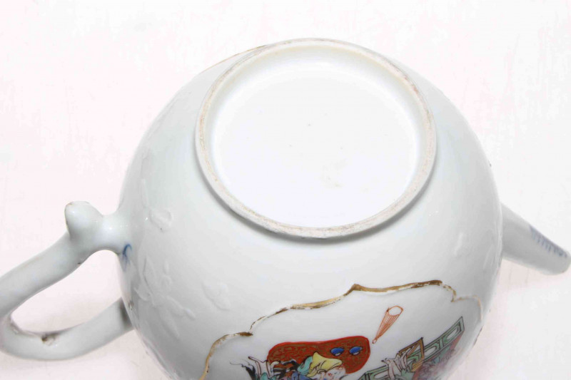 Late 18th Century Chinese porcelain teapot, tea bowl and saucer, having painted panels of happy figures interior and underglaze blue borders