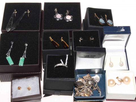 Collection of boxed jewellery including silver charm bracelet and gold...