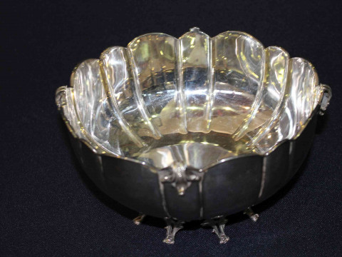 Continental silver bowl of panelled form and with pierced elegant feet,...
