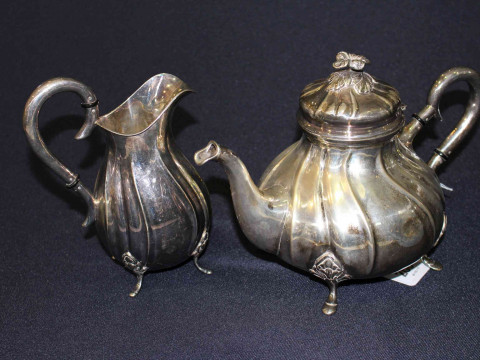 Continental silver teapot and milk jug, of baluster wrythen shape, 28oz