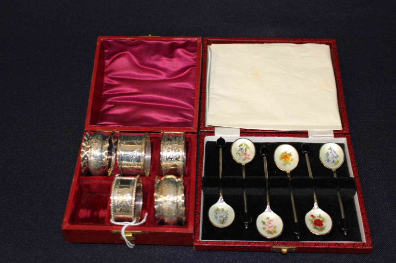 Collection of six silver napkin rings with engraved decoration and cased enamel on silver coffee spoons