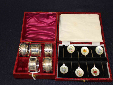 Collection of six silver napkin rings with engraved decoration and cased...