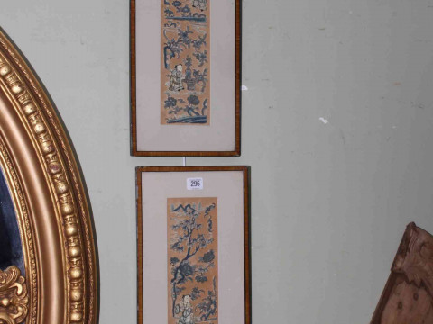 Pair framed Chinese silks depicting figures in gardens