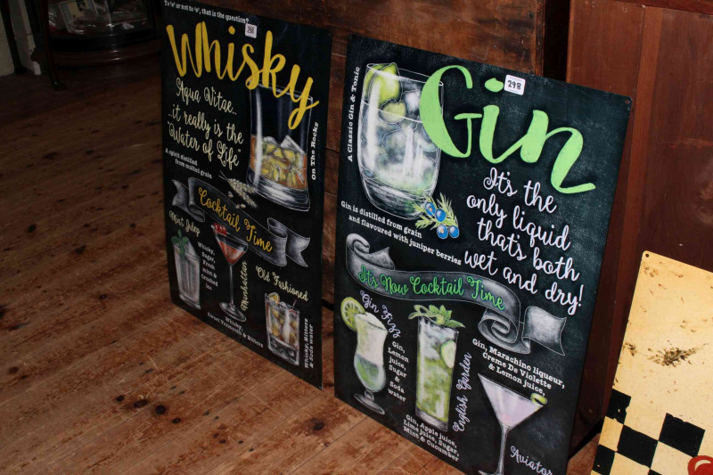 Two signs, whisky and gin