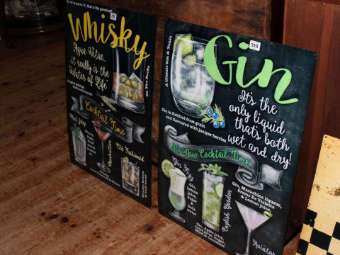 Two signs, whisky and gin