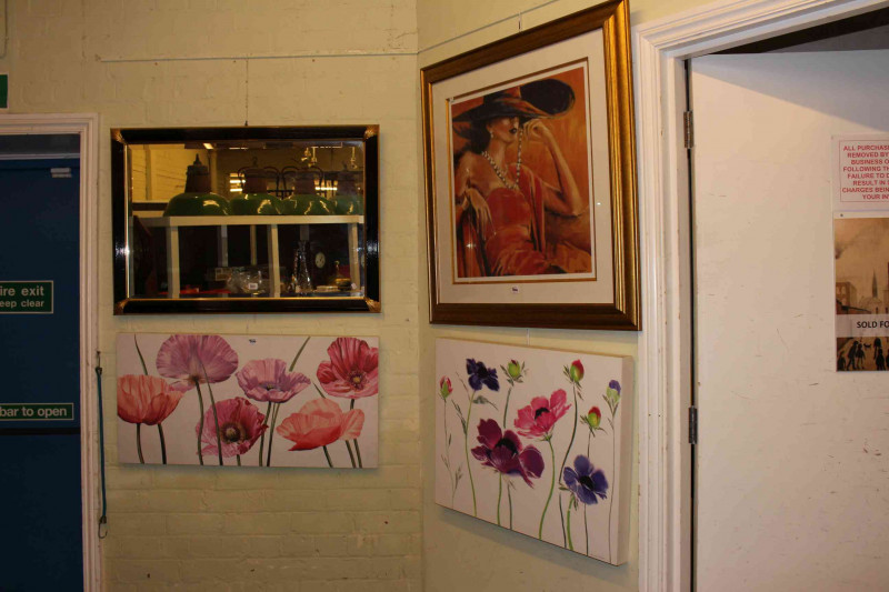 Black and gilt framed rectangular wall mirror and three various pictures