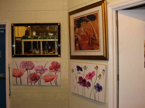 Black and gilt framed rectangular wall mirror and three various pictures