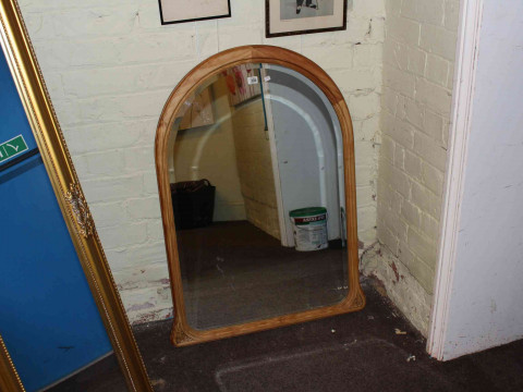 Arched overmantel mirror