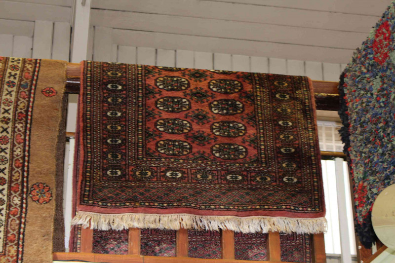 Persian design rug with a rose pink ground 1.60 by 0.96
