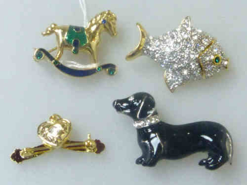 Four Brooches