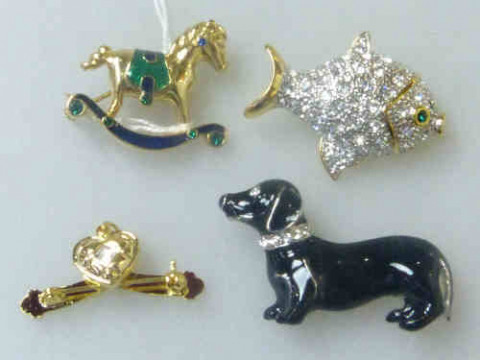 Four Brooches