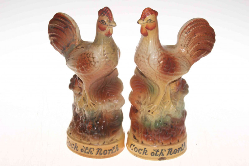 Pair of pottery 'Cock o'th North' cockerels.