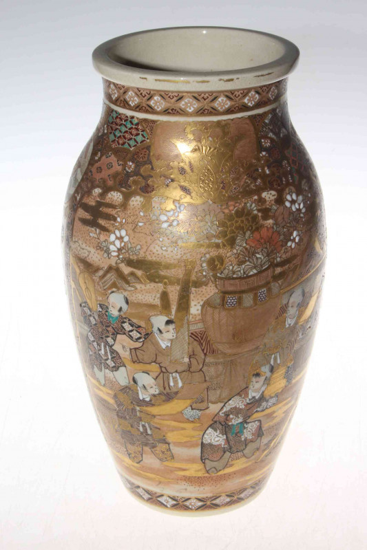 Japanese Meiji Period Satsuma vase, profusely gilded and decorated with figures, butterflies and pattern, 30cm high.