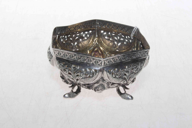 19th Century Indian silver basin, of octagonal form with embossed, chased and pierced decoration.