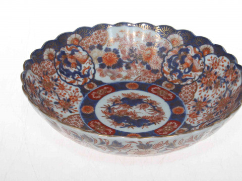 19th Century Imari bowl of fluted circular form and with profuse decoration,...